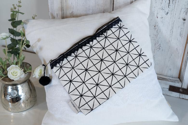 Black and white cosmetic bag